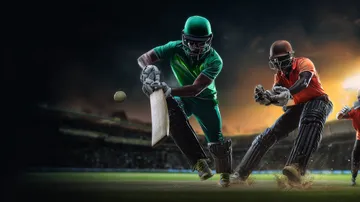 একজন পুরুষ তার ল্যাপটপে জয়ের মুহূর্ত উদযাপন করছেন, চারপাশে ভাসছে গেমিং আইকন—যা 4777BED গেমসের উত্তেজনাকে প্রকাশ করে।