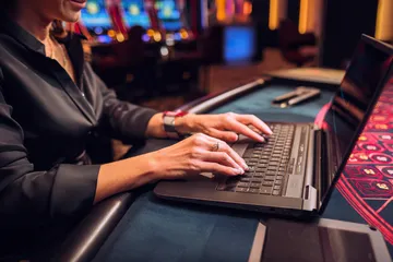 A laptop glowing with a bright login prompt in a minimalistic setup, symbolizing the protected access system at 4777BED.